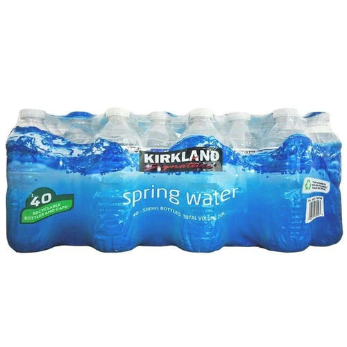 Pack of 40 Kirkland Signature spring water bottles, 500ml each, wrapped in blue plastic packaging with '40 recyclable bottles' label.